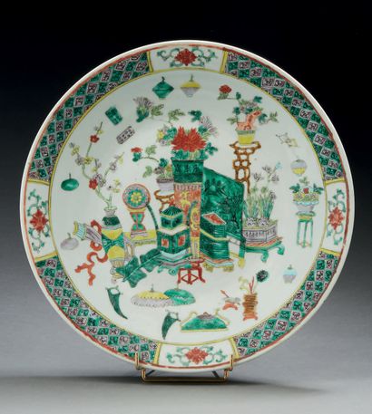 CHINE Circular porcelain dish decorated in enamels of the green family with vases...