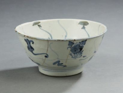 VIETNAM Two circular porcelain bowls with various decorations of stylized flowers....