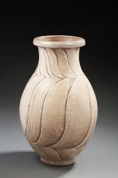 null René BUTHAUD (1886-1986)

Vase piriforme à col en débordement en céramique émaillée...