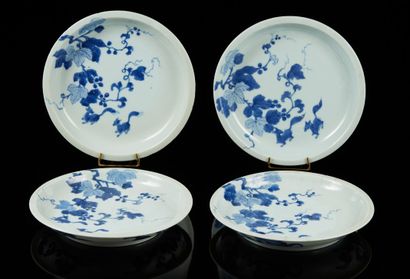 CHINE pour le Vietnam Four circular porcelain cups with high heel decorated in blue...