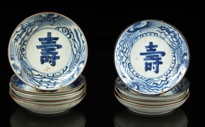 CHINE pour le Vietnam Nine circular porcelain dishes decorated in blue underglaze...