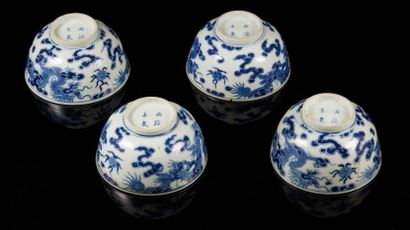 CHINE pour le Vietnam Four circular porcelain bowls decorated on the outer wall in...