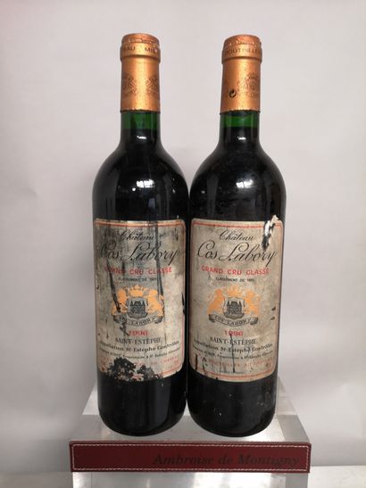 null 2 bouteilles Château COS LABORY - 5e GCC Saint Estèphe 1996 

Etiquettes tachées...