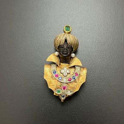 null Gold 750 mm and silver 800 mm brooch-CLIP representing a Moor bust, an emerald...