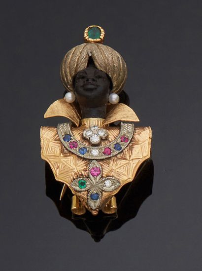 null Gold 750 mm and silver 800 mm brooch-CLIP representing a Moor bust, an emerald...