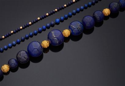 null NECKLACE in yellow gold 750 mm composed of a fall of lapis lazuli balls, some...