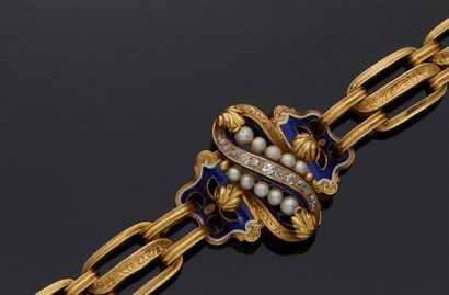 null BRACELET en or jaune 750 mm et émail bleu à liseré blanc à motif de noeud et...