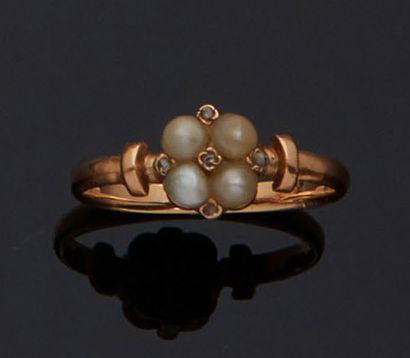 null * Pink gold ring with four small pearls and uncut diamonds.
Gross weight; 2.3...