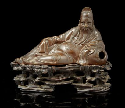 CHINE-VIETNAM, début XXe siècle Sujet en bronze de patine brune, représen­tant le...
