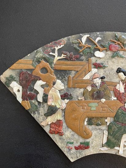 null China, circa 1900
Element of a marble screen cover, in the form of a fan inlaid...