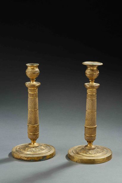 null Pair of gilded bronze candlesticks

Missing a wick

H. 26 cm