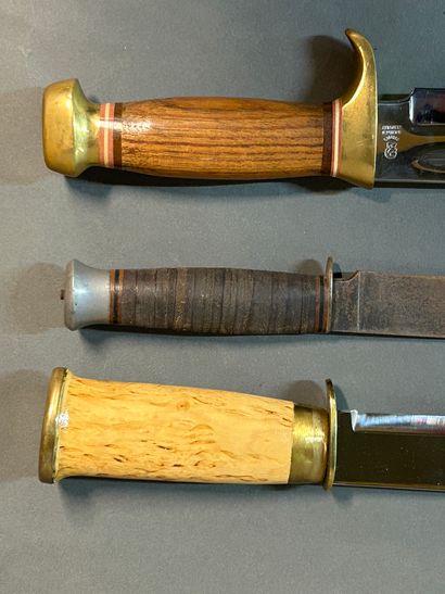 null Set of three pieces.

Including

-A Finnish hunting knife by J.Marttiini. Wooden...