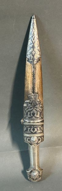 null Caucasian dagger called Kinjhal. 

Mounted on a horn with silver threads.

Straight...