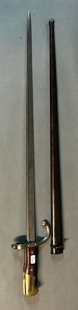 null Bayonet model 1874 said Gras.

Brass pommel, two riveted wooden plates, curved...