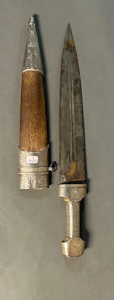 null Caucasian dagger called Kinjhal. 

Mounted on a horn with silver threads.

Straight...