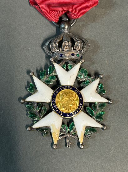 null Legion of Honor instituted in 1802.

Knight's cross in silver and enamel. 

Second...