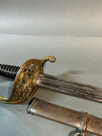 null Luxurious senior officer's saber model 1855.

Gilt bronze and horn mount. 

Oval...
