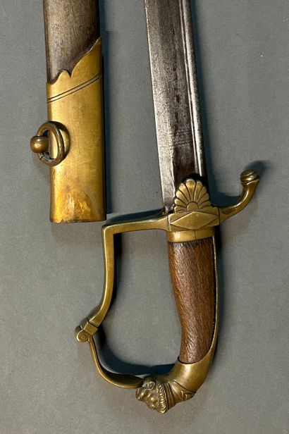 null Saber of officer of light cavalry.

Bronze mounting.

Cap in the shape of a...