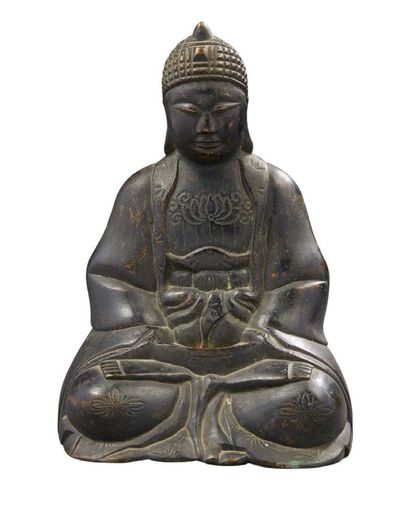 CHINE XXe siècle Bouddha en bronze assis en méditation.
H. : 25 cm