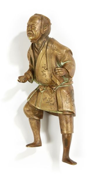 JAPON, vers 1900 Personnage en cuivre de patine doré représentant un vieillard.
H....