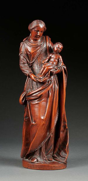 null Rare GRANDE SCULPTURE en buis sculpté représentant une Vierge à l'Enfant.
Flandres,...