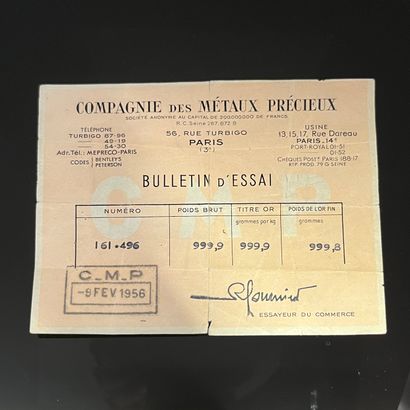 null GOLDEN LINGOT, with its issue voucher COMPAGNIE DES METAUX PRECIEUX dated February...