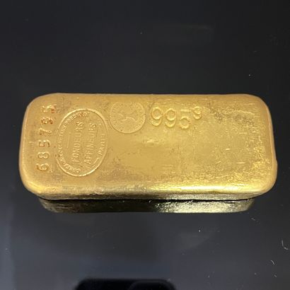 null GOLDEN LINGOT, with its issue voucher COMPAGNIE DES METAUX PRECIEUX dated January...