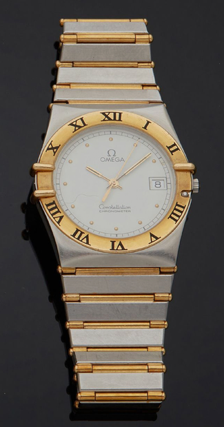 null OMEGA
Modèle Constellation chronomètre.
Montre-bracelet d'homme en or et acier,...