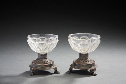 null Pair of crystal and silver salerons each resting on three claw feet.
Paris 1819-1838.
(one...