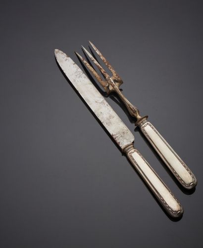 null Cutlery for leg of lamb, handles in filled silver and blade and fork in steel.
Minerve...