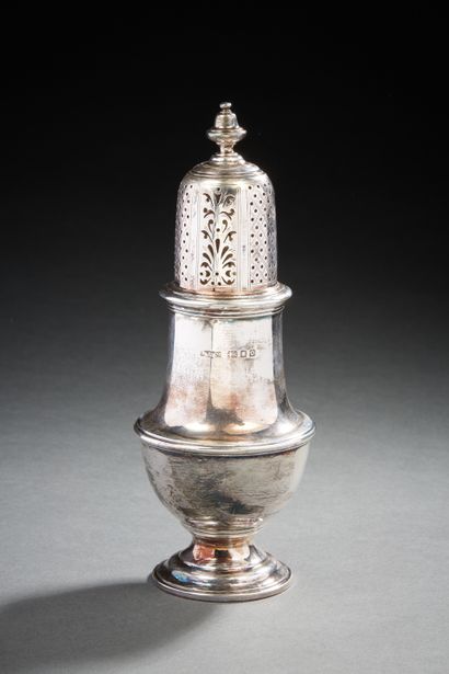 null Saupoudroir in plain silver of baluster form resting on a pedestal, the lid...