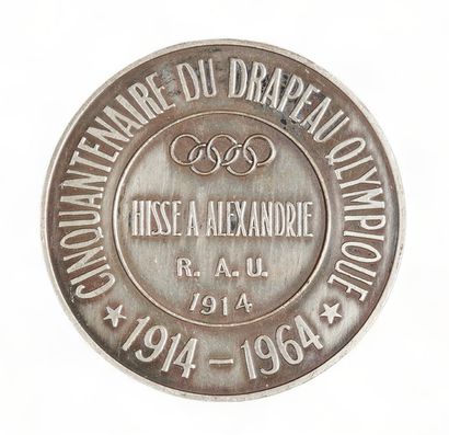 JEUX OLYMPIQUES 
Médaille en métal argenté...