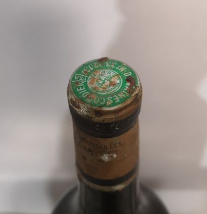 null 1 bouteille Château TALBOT - 4e Gcc Saint Julien 1965 Etiquette tachée. Niveau...