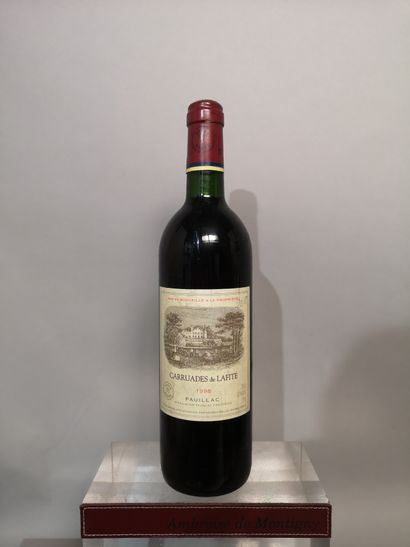 null 1 bouteille CARRUADES de Ch. LAFITE - Pauillac 1998 Étiquette légèrement tachée,...