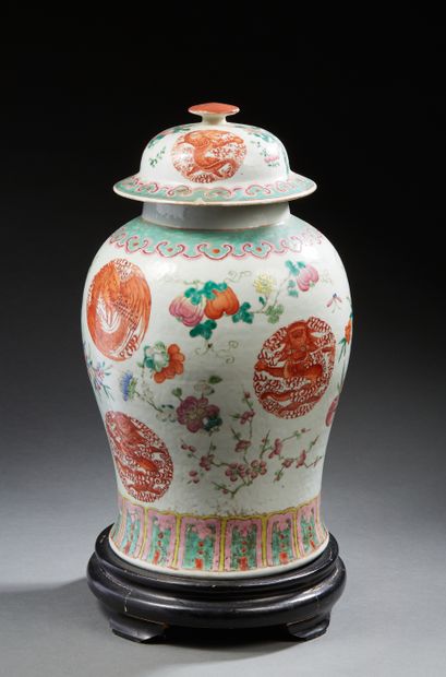 null CHINA
Porcelain covered vase of baluster shape decorated in Famille Rose enamels...