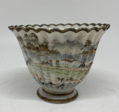 null JAPAN 
Part of a tea service in grodroned porcelain decorated with a lake landscape,...