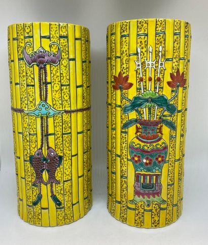null CHINA
Pair of vases with yellow background imitating bamboo, decorated in relief...