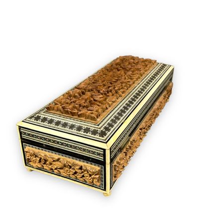 null BOX 
Rectangular box with carved wood panels surrounded by bone fillets.
Middle...