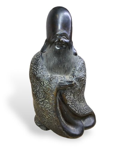 null CHINE
Figure en bronze à patine brune figurant Shulao.
H. : 23,5 cm.
(Percée...