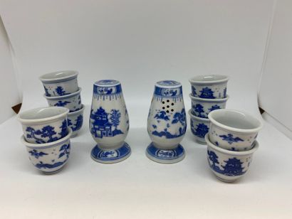 null CHINA
Set of ten sorbets and two porcelain bottles decorated in blue with landscapes.
H...