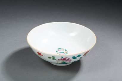 null CHINA
Large porcelain bowl decorated on the outside with branches and flowers....