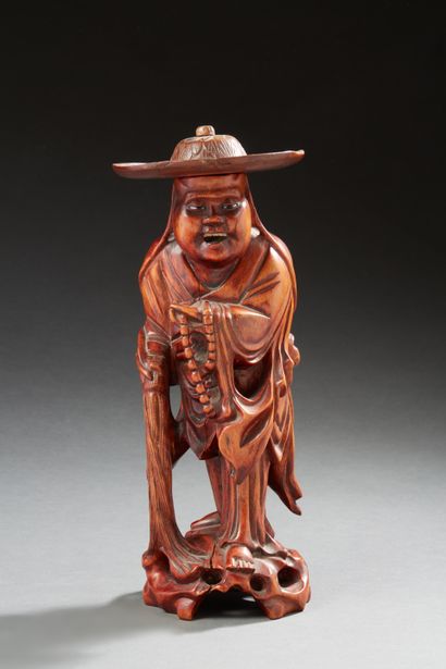 null JAPAN
Root carved figurine representing Shoulao, eyes and teeth in bone.
First...