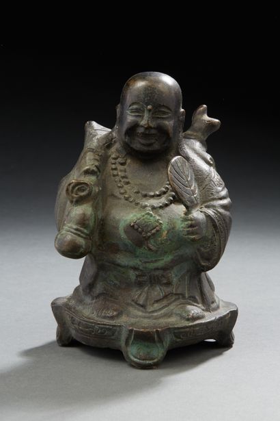 null Chine XXe siècle,
Groupe en bronze représentant le bouddha milefo tenant son...