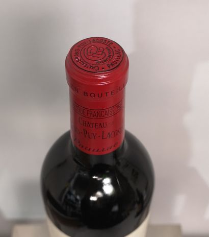 null 1 bouteille Château GRAND PUY LACOSTE - 5ème Gcc Pauillac 2000 Etiquette légérement...