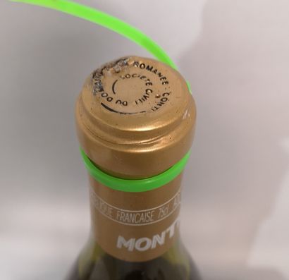 null 1 bouteille MONTRACHET Domaine de la ROMANEE CONTI 2001 Etiquette tachée et...