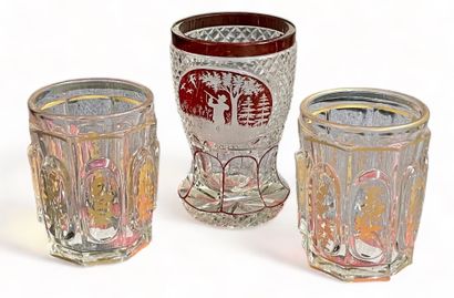 null Set of three cut crystal glasses, one with hunting design.
H. 14 cm (for the...