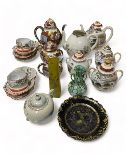 null Set of various porcelain tea sets with Far Eastern decorations. Including pourers,...