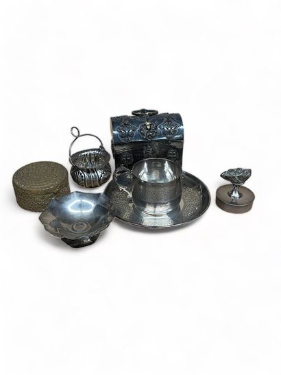 null Set including a small curved silver-plated box, a silver-plated cup and saucer,...