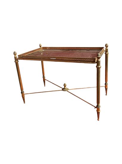 null Attributed to BAGUES
Rectangular coffee table in gilded brass, top in clear...