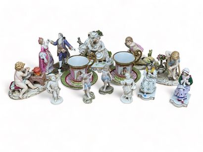 null Set comprising eleven statuettes (including Meissen) and two porcelain cups
20th...